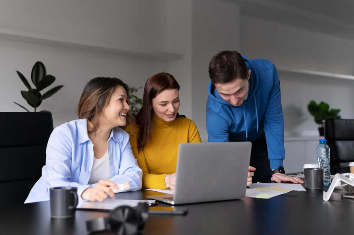 office-workers-working-together-as-team 1